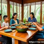 의식적 식사법과 신체 이미지 - A serene Malaysian family dining scene showing diverse members eating traditional dishes like ikan b...